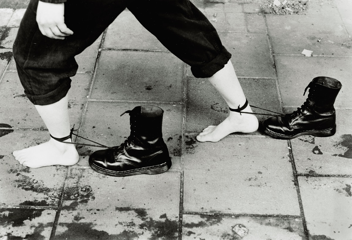 Mona Hatoum (1952–), Performance Still, 1985, black and white photograph mounted on aluminium, 30 1/8 x 42 1/2 in. (76.5 x 108 cm)