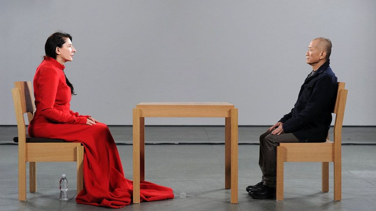 In Marina Abramović’s 2010 retrospective at MoMA, The Artist is Present, she sat silently facing visitors for over 700 hours.